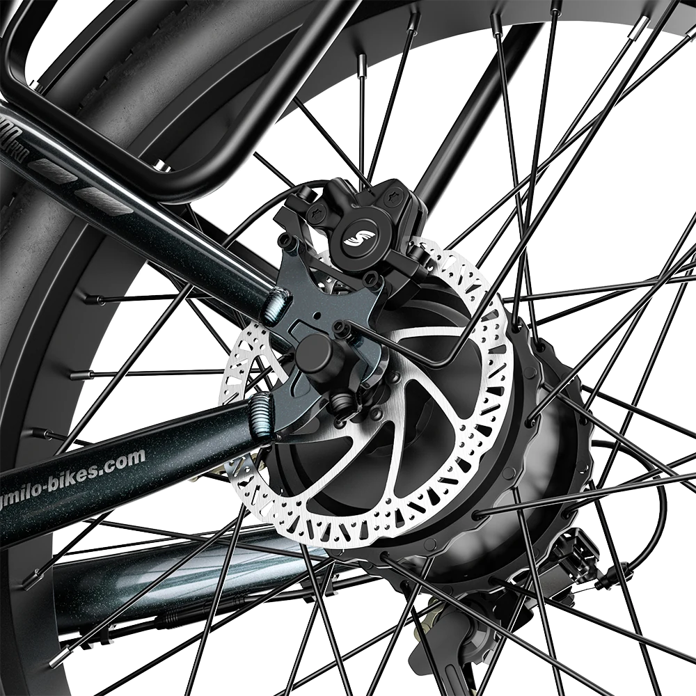 Close-up of the Shengmilo S700 PRO rear disc brake rotor and caliper.