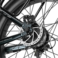 Close-up of the Shengmilo S700 PRO rear disc brake rotor and caliper.