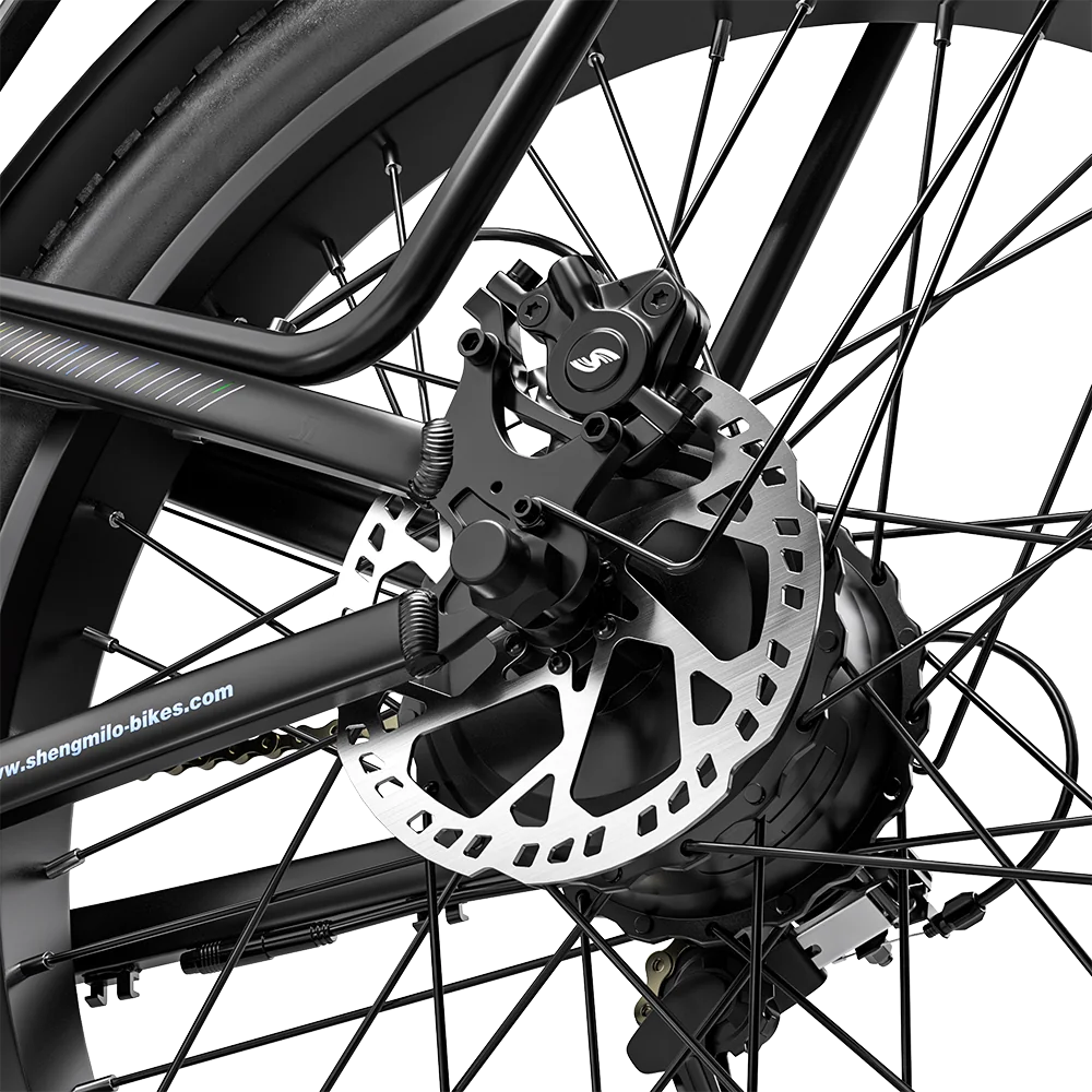Close-up of the Shengmilo S600 PRO rear disc brake rotor and caliper