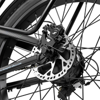 Close-up of the Shengmilo S600 PRO rear disc brake rotor and caliper